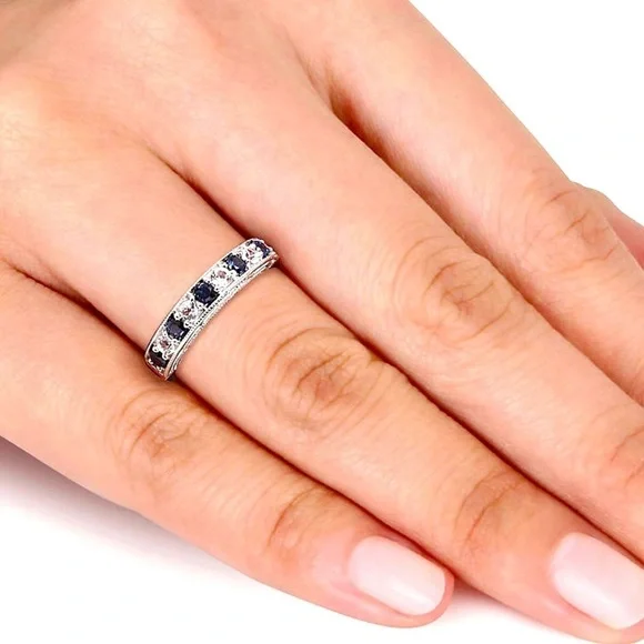 Sterling silver band with blue and white sapphire stones. - Picture 3 of 4